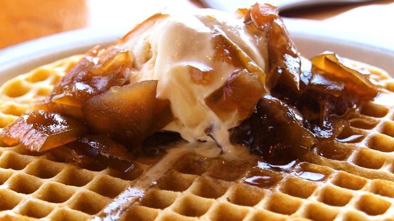 Waffle topped with maple hurricane sauce