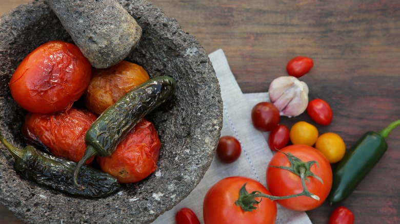 Mortar pestle tomato jalapeño roasted