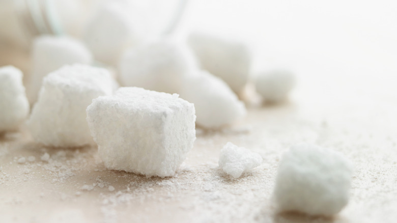 Sugar cubes on white background