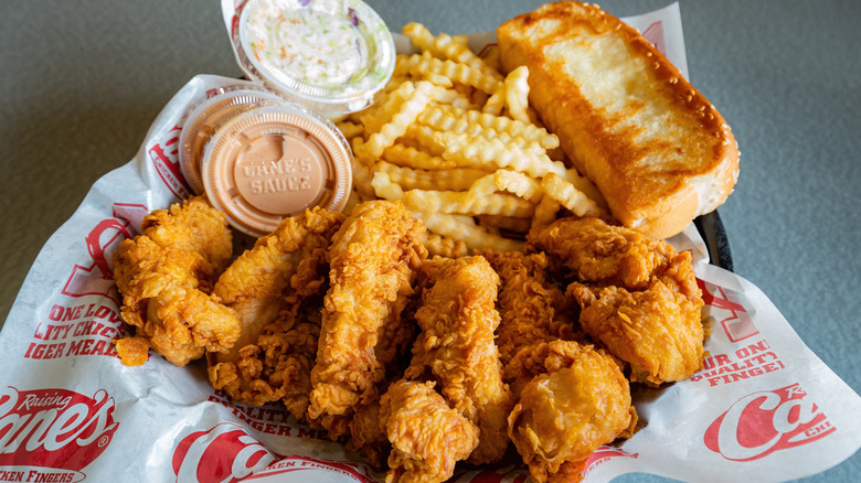 Basket holding Raising Cane's meal