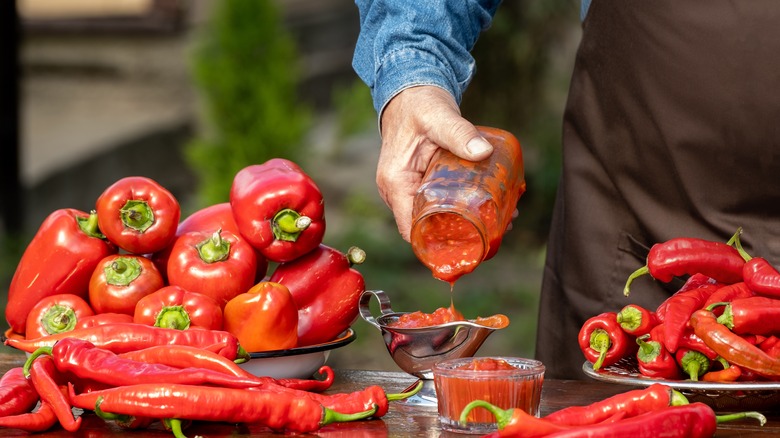 Peppers and jarred pepper sauce