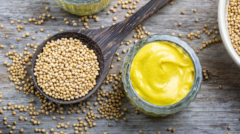 Mustard seeds and mustard sauce