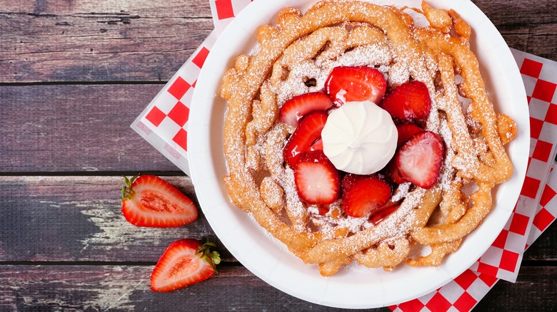 funnel cake topped with strawberries