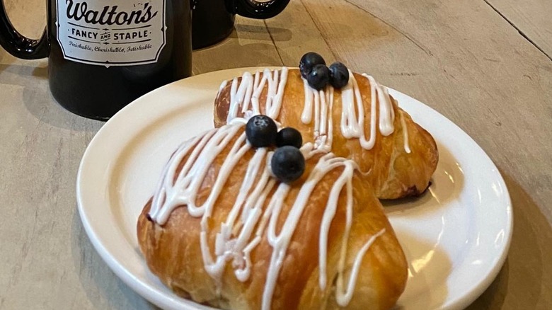 Croissant and coffee cup at Walton's Fancy and Staple