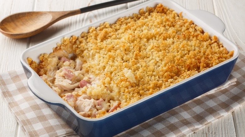 A cordon bleu casserole in a blue and white casserole dish