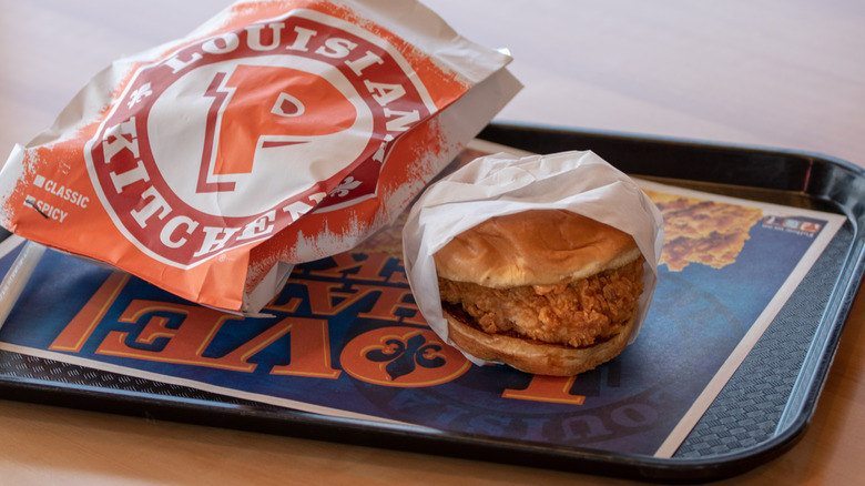 Popeyes chicken sandwich on tray