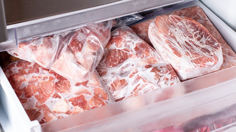 Wrapped meat in freezer drawer