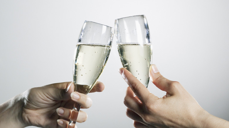 champagne glasses clinking