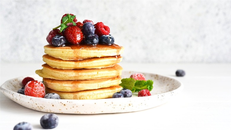 Stack of pancakes with berries 