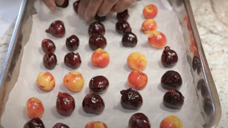 Cherries on baking sheet
