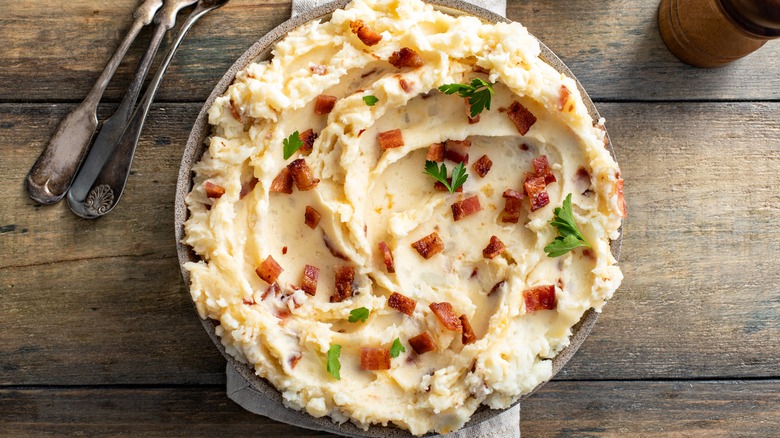 Loaded mashed potatoes with parsley and bacon