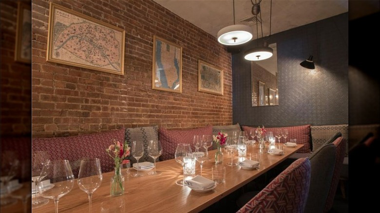 Compagnie tables with wine glasses