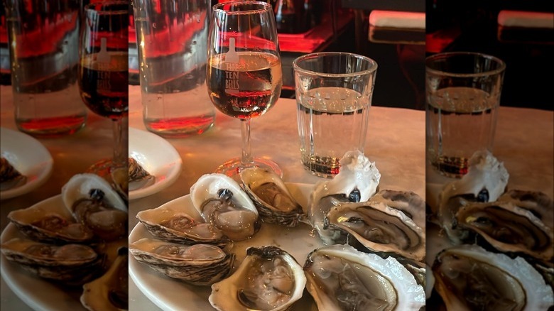 glass of wine and oysters
