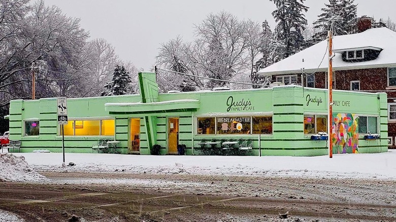 Exterior of Judy's Family Cafe with a mint green façade