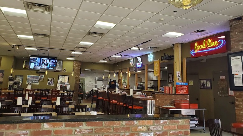 Interior of Arnold's Country Kitchen, with tables and stools at the counter
