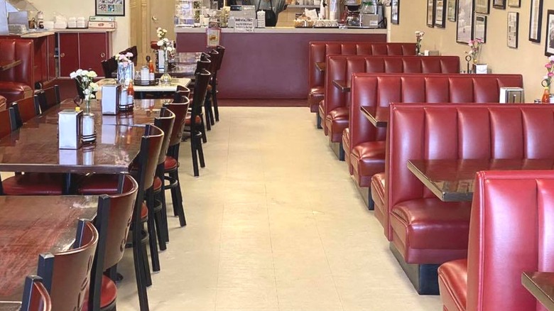 Tables and booths inside John's Cafe