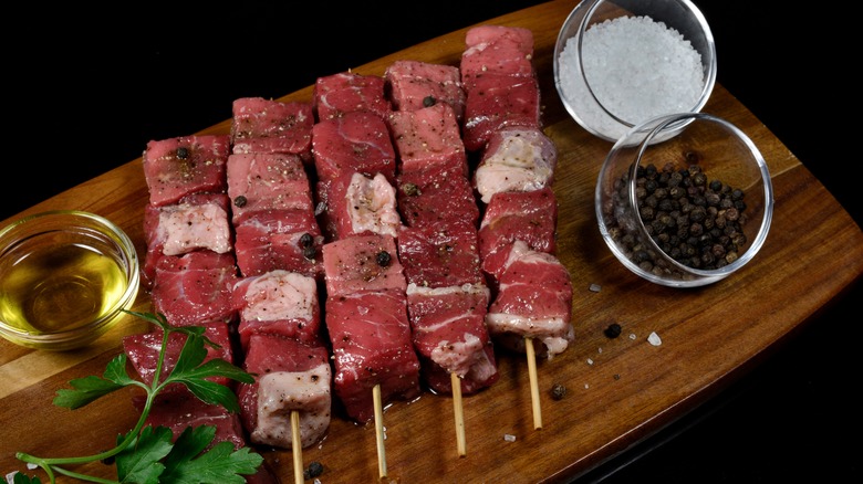 meat kebabs with salt and pepper