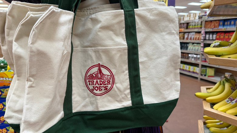 Trader Joe's canvas shopping bags for sale in store.