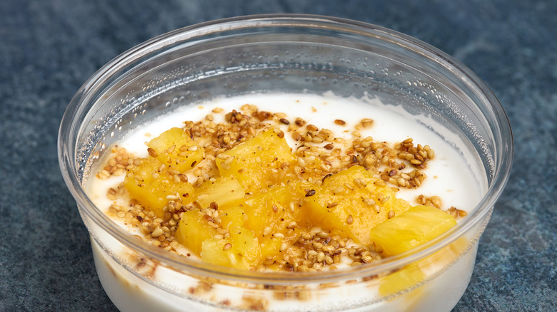 Haupia topped with pineapple and sesame
