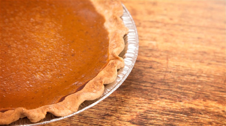 Pumpkin pie in disposable pie pan 