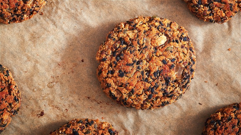 Cooked veggie burgers on parchment paper 
