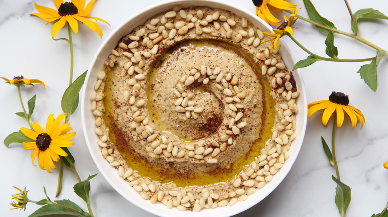 Pine nut spiral on hummus