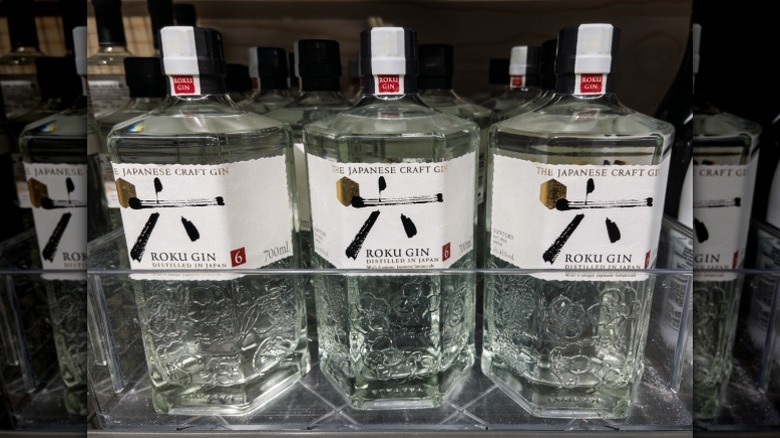 Three bottles of Roku Gin in a lineup