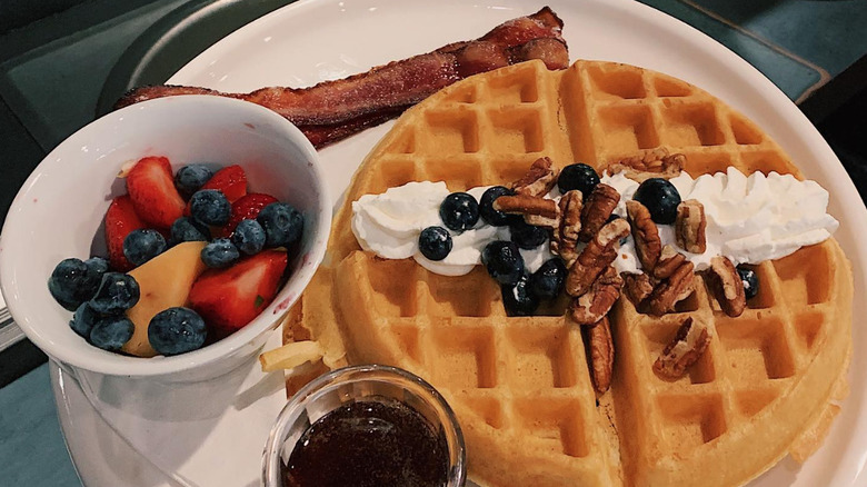 Blueberry pecan waffles with bacon