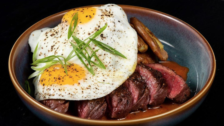 steak and eggs in bowl