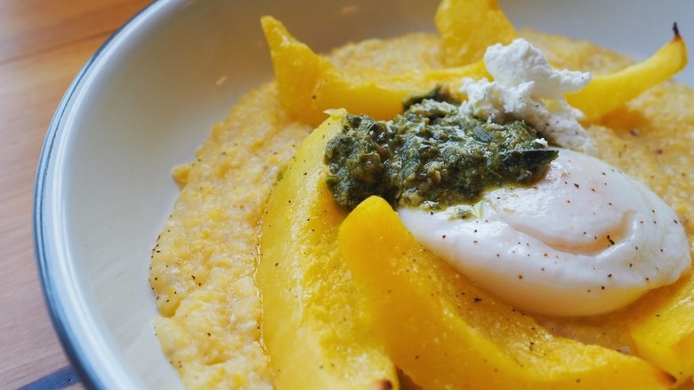 Poached egg and squash on grits