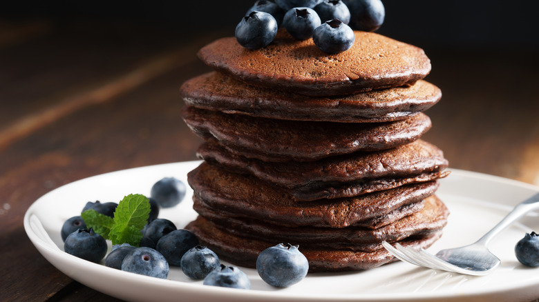Chocolate pancakes with fresh blueberries