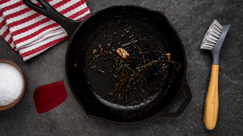 Cast iron pan with scrub brush