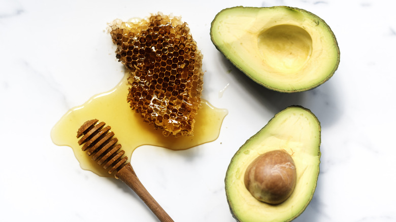 Avocado honeycomb, honey, and avocados