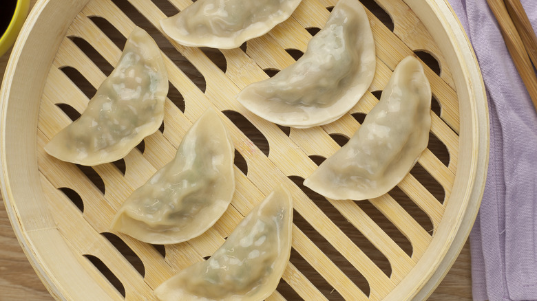 Mandu dumplings in bamboo steamer