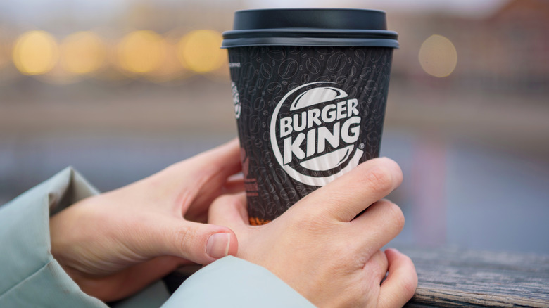 hand holding Burger King coffee