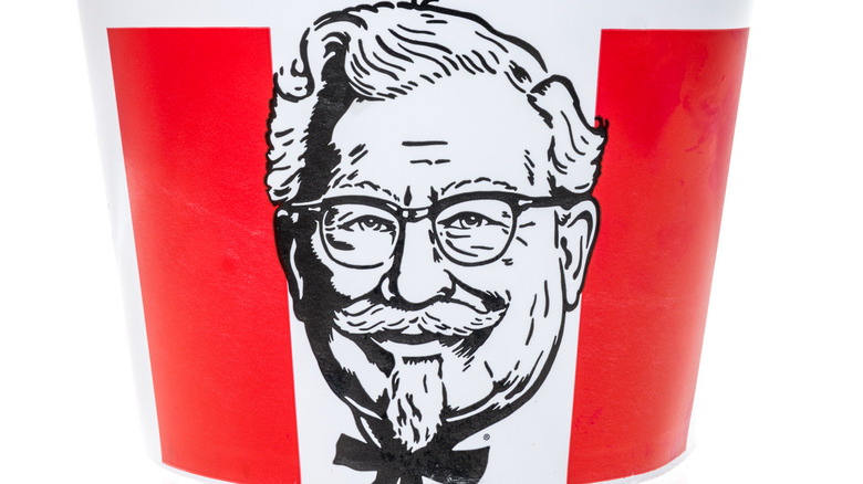 colonel sanders on a box 