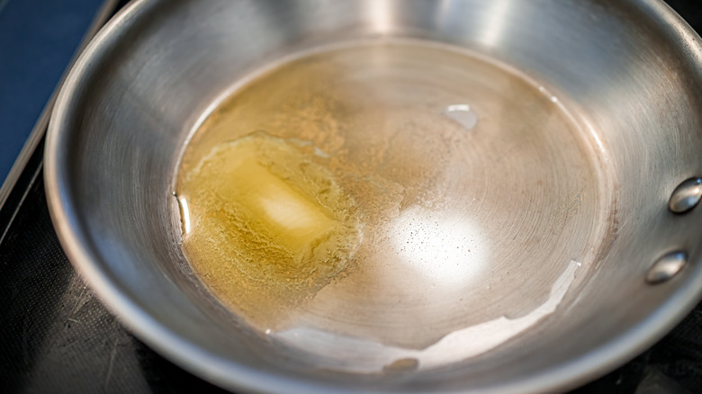 Ghee cooked in metal pan