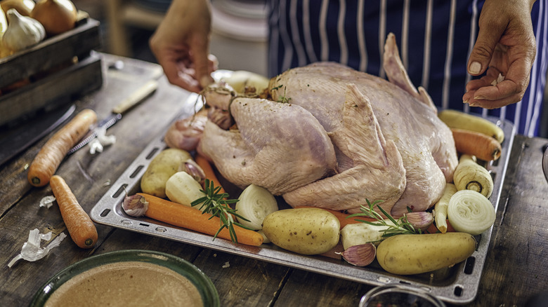 raw turkey and vegetables