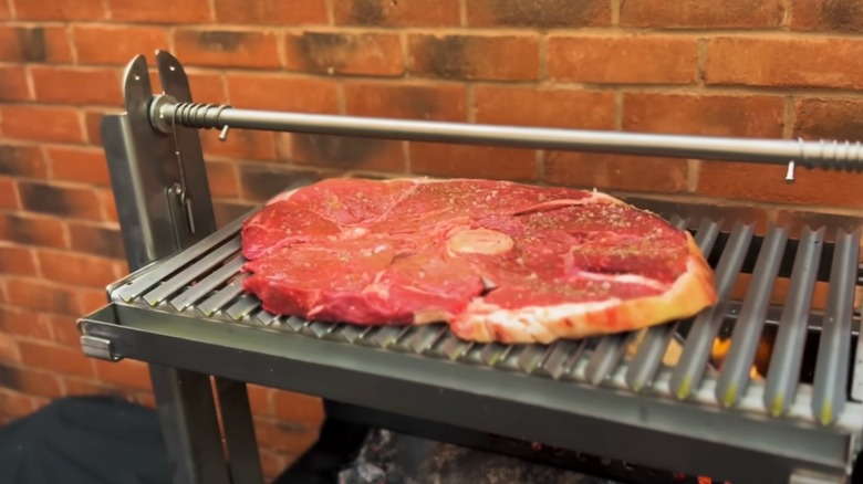 Raw Tom and Jerry Steak sitting on grill