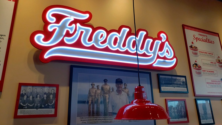 Freddy's sign and wall posters