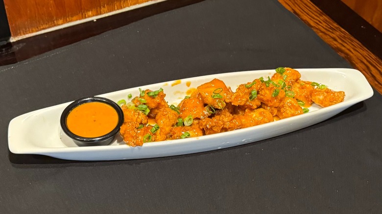 Spicy Chicken Bites from LongHorn Steakhouse on black napkin