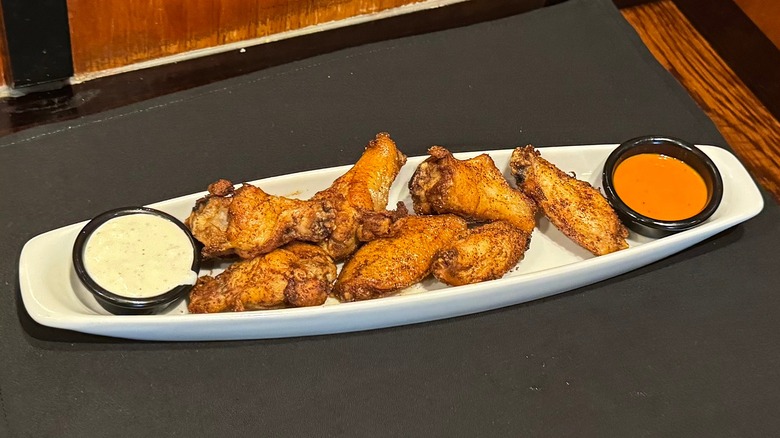 Seasoned Steakhouse Wings from LongHorn Steakhouse on black napkin