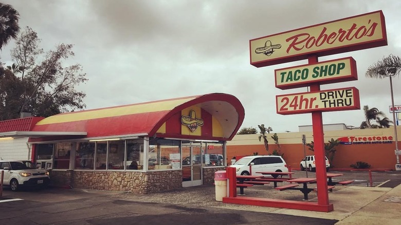 The Roberto's Taco Shop welcome sign and restaurant exterior