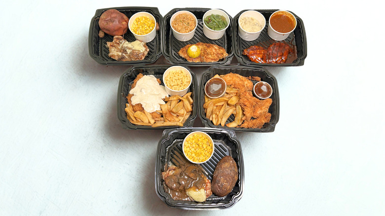 Six Texas Roadhouse chicken dinners arranged together in a triangular pattern on a white background
