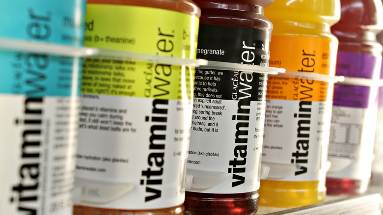 Bottles of Vitaminwater on display in a store