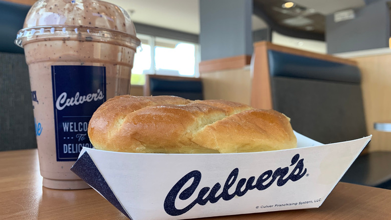 Culver's fish sandwich and concrete mixer on a table in the restaurant