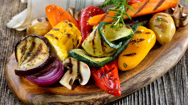 wooden platter of grilled vegetables