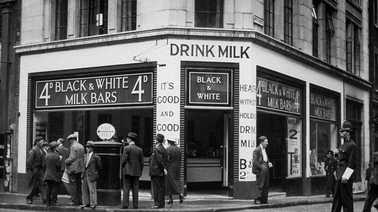 Women operate a portable milk bar