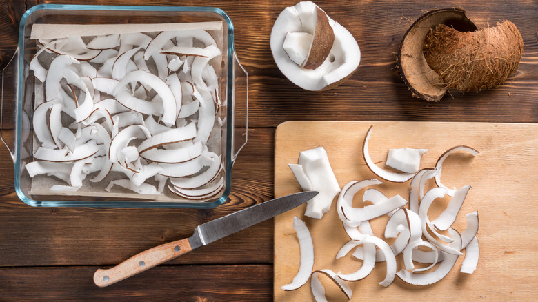 fresh coconut meat cut on wood board