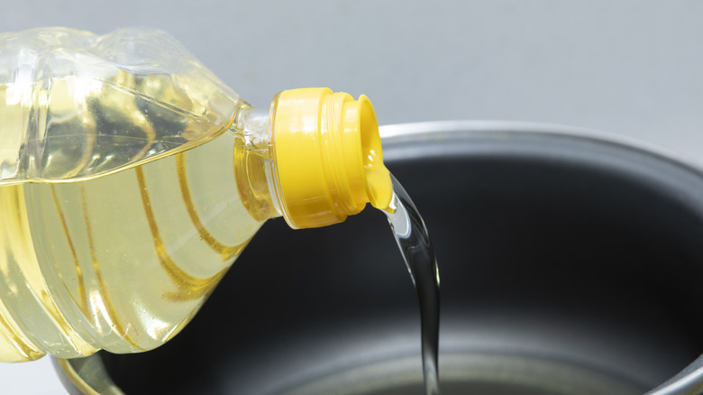 vegetable oil being poured